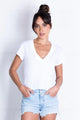 Suri Deep V Cap Sleeve in White.